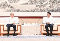 袁家军会见最高人民法院院长张军
